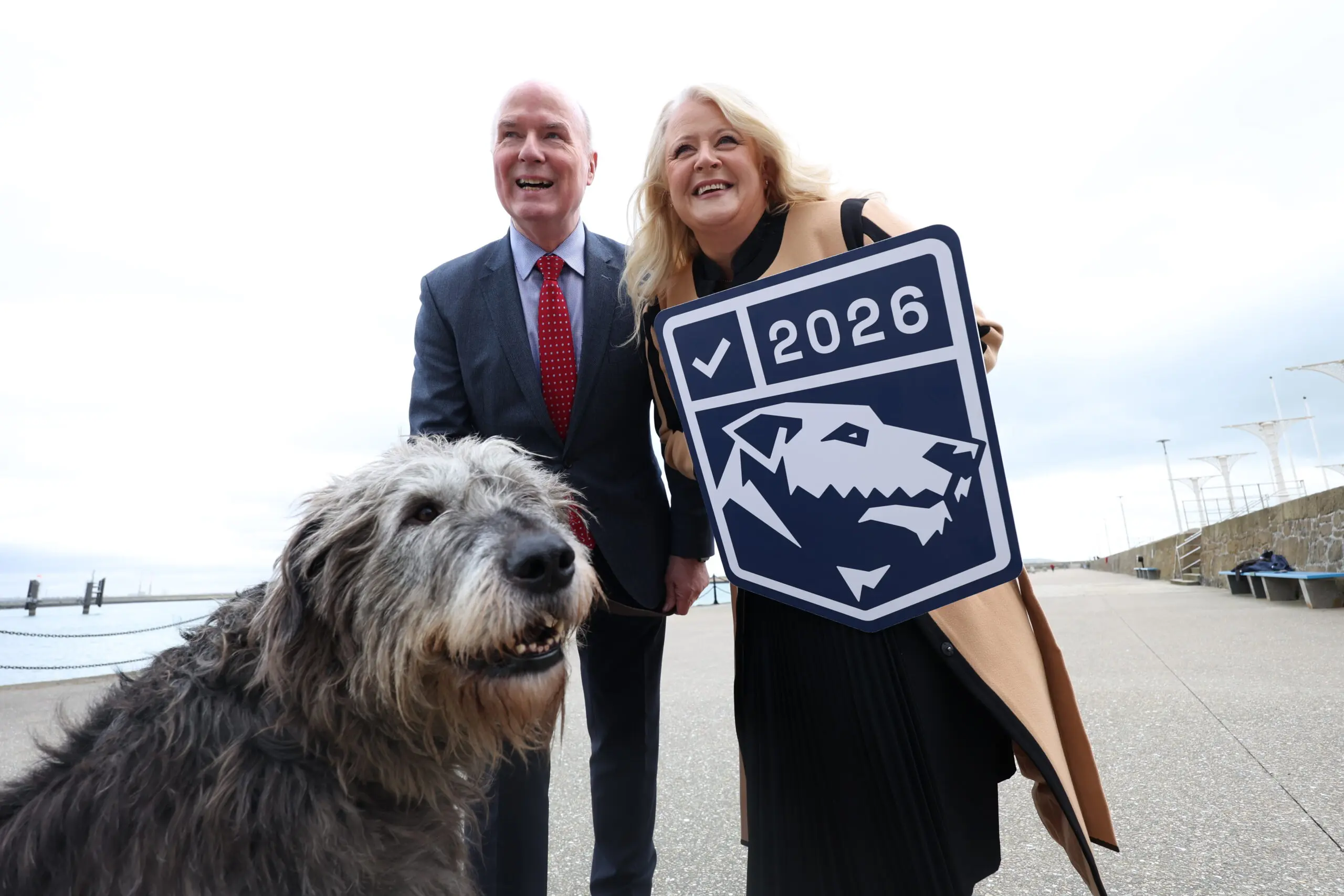 David Curtin and Louise McKeown Doogan of .IE with the Digital Trust Mark badge, and an Irish wolfhound